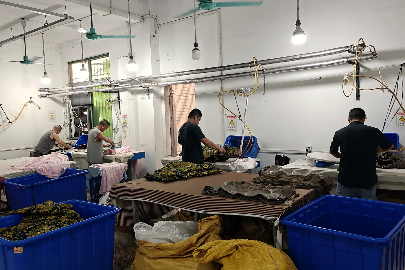 Finishing and inspection tables on the production floor